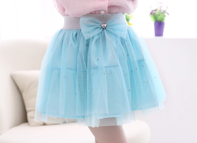 Pecsétes gyerekszoknya világos színekben, béléssel és szalagos elemmel