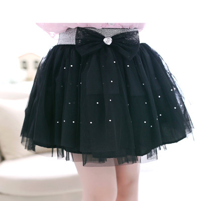 Pecsétes gyerekszoknya világos színekben, béléssel és szalagos elemmel