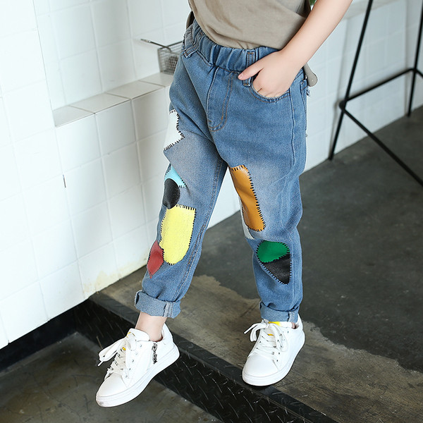 Blugi copii pentru fete de culoare deschisa cu motive colorate