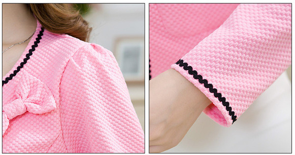 Modern női kabát hímzéssel és szalaggal