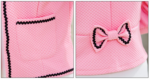 Modern női kabát hímzéssel és szalaggal