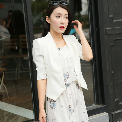 Casual γυναικείο σακάκι με ασύμμετρο μήκος και 3/4 μανίκια