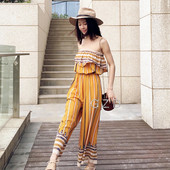 Καλοκαιρινό γυναικείο ολόσωμο παντελόνι σε κίτρινο χρώμα με πέπλα