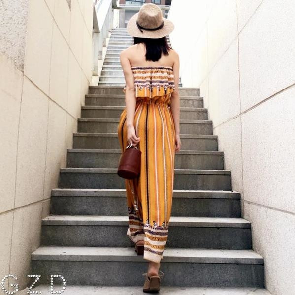 Καλοκαιρινό γυναικείο ολόσωμο παντελόνι σε κίτρινο χρώμα με πέπλα