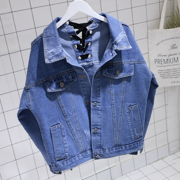 Спортно-ежедневно дамско дънково яке с кръстосани връзки на гърба 