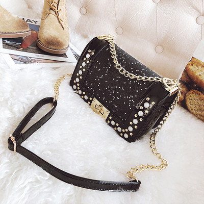 Mini geantă de mână strălucitoare în negru cu decor cu pietre