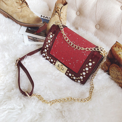 Mini geantă de mână strălucitoare în negru cu decor cu pietre