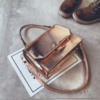 Γυναικεία λουστρίν τσάντα με δύο λαβές και σε ασημί χρώματα