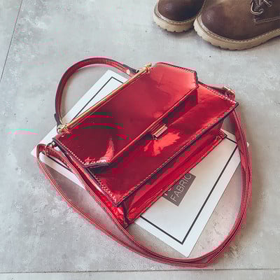 Γυναικεία λουστρίν τσάντα με δύο λαβές και σε ασημί χρώματα