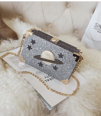 Κομψή μίνι γυναικεία τσάντα με εφαρμογή και μεταλλική λαβή