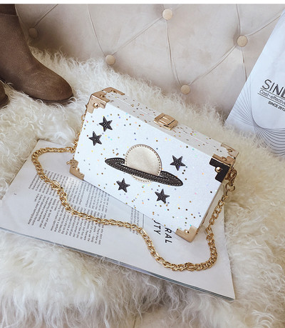 Κομψή μίνι γυναικεία τσάντα με εφαρμογή και μεταλλική λαβή