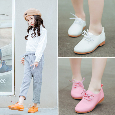 Stylish children`s shoes for girls with laces in four colors