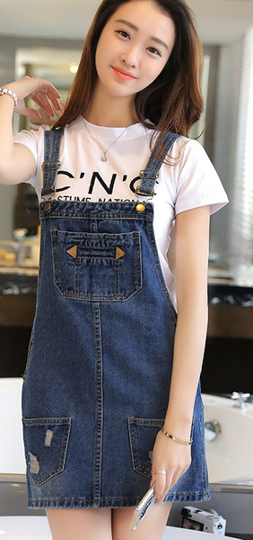 Női overall állítható pántokkal, zsebekkel és fém elemekkel