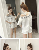 Σπορ  σύντομο γυναιείο σετ  από δύο μέρη-shirt + παντελόνι freestyle με μια επιγραφή σε μαύρο και άσπρο χρώμα