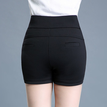 Elegáns női szoknya-nadrág fekete színben, hímzéssel