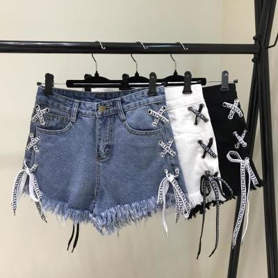 Women`s short jeans in three colors with cross ties