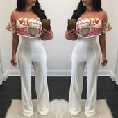 Κομψές γυναικείες φόρμες με πέτρες ώμους και λουλούδια με άνθη σε λευκό χρώμα