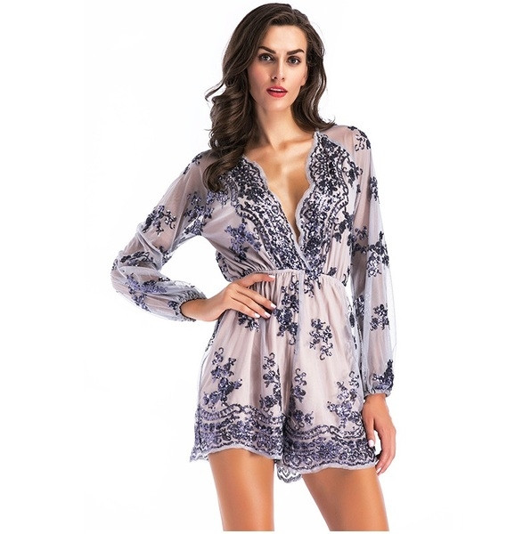 Κομψή  γυναικεία σαλοπέτα με ντεκολτέ σε σχήμα V και διακοσμητικές πούλιες σε δύο χρώματα