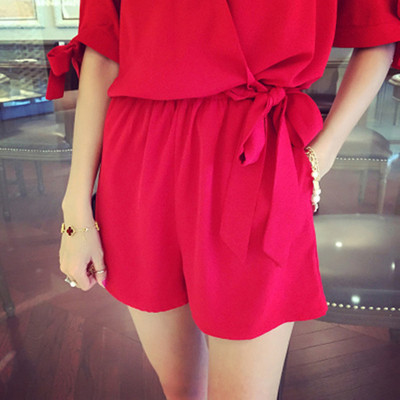 Salopetă elegantă pentru femei, cu decolteu în V, mâneci 3/4 cu panglică și buzunare