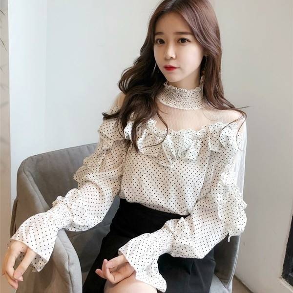 Stílusos, elegáns női blúz pöttyökkel fehér és fekete színben