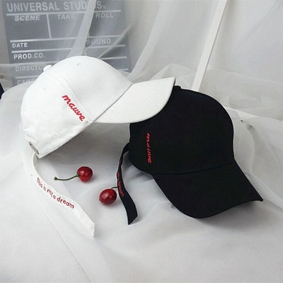 Women`s sports-casual hat with a trump card with a side inscription in white and black