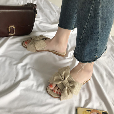 Γυναικείες παντόφλες σε δύο χρώματα με μεγάλη κορδέλα