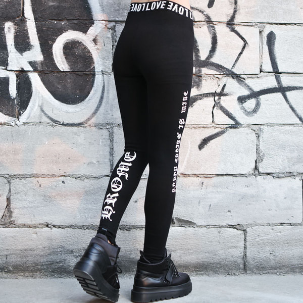 Stílusos női leggings fekete színben, feliratokkal
