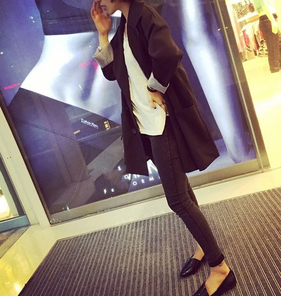 Jachetă de ploaie lungă de damă - un model interesant