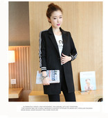 Jachetă de damă lungă, sportivă și elegantă, cu margini pe mâneci