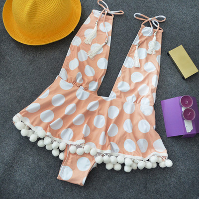 Άνετο γυναικείο μαγιό ολόσωμο με διακοσμητικές μπάλες και βαθύ λαιμόκοψη