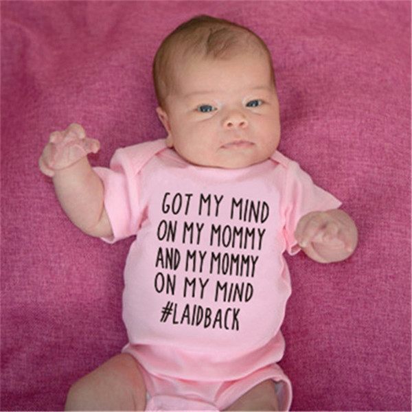 Gyermek overall fehér és rózsaszín felirattal