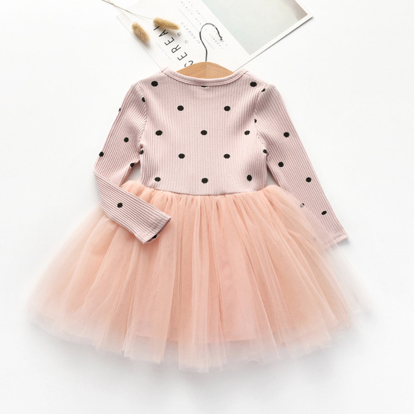 Пролетно-есенна разкроена рокличка на точки и с панделка