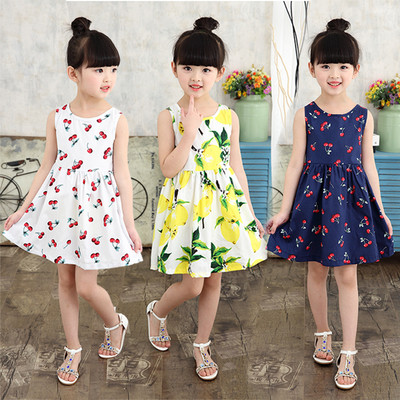 Children`s cut dress with a fruit print in several colors
