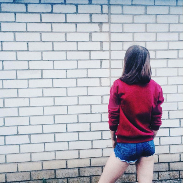 Bluză de damă cu mâneci lungi, inscripție și guler în formă de O (croială extinsă)