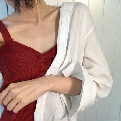 Top tricot de primăvară cu o împletitură în diferite culori