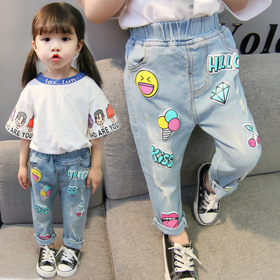 Blugi de copii eleganti pentru fete rupti cu o mini aplicatie - doua modele