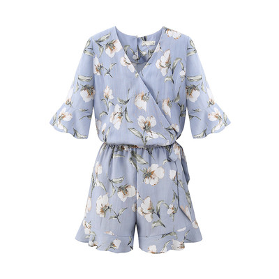 Salopetă de damă elegantă cu motiv floral, cu decolteu în V, în albastru