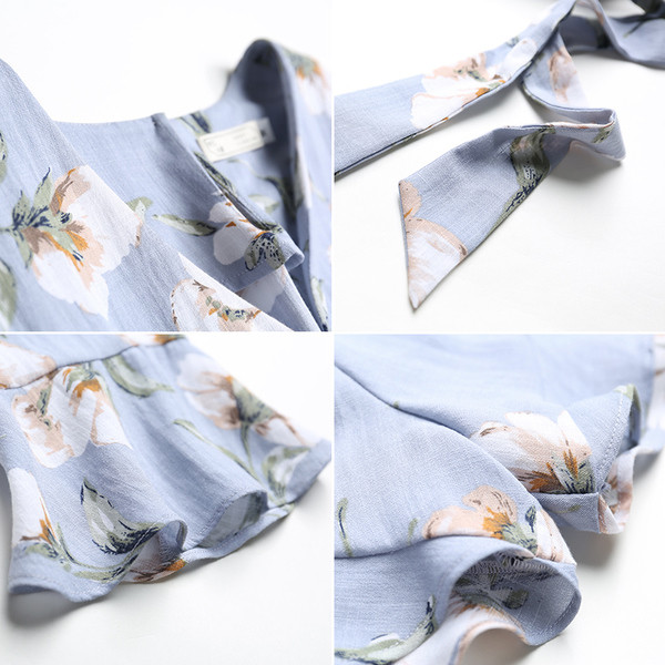 Salopetă de damă elegantă cu motiv floral, cu decolteu în V, în albastru