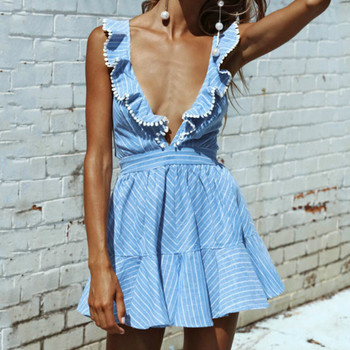 Stílusos női ruha mély nyakkivágással, kék színben