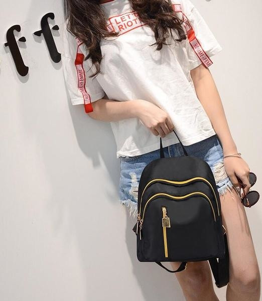 Rucsac mic de dama simplu de culoare neagra cu fermoar colorat