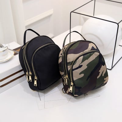 Women`s small backpack with a long handle in three colors