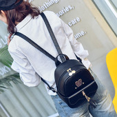 Öko bőrből készült női hátizsák fém elemekkel és díszítő kövekkel