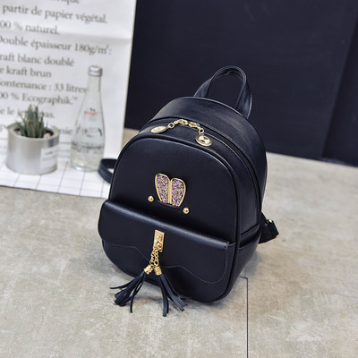 Öko bőrből készült női hátizsák fém elemekkel és díszítő kövekkel