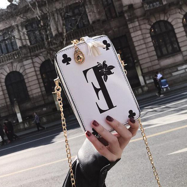 Geanta mini de dama in forma dreptunghiulara cu imprimeu si maner metalic