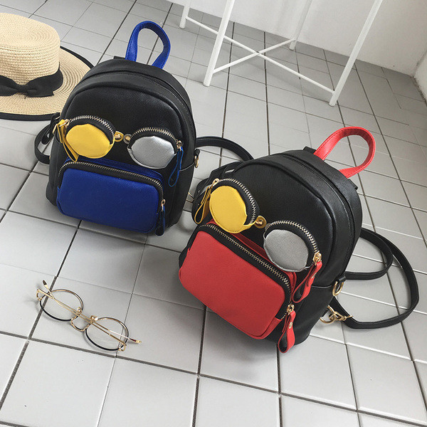 Rucsac mic de dama din piele ecologica in doua culori cu buzunare colorate