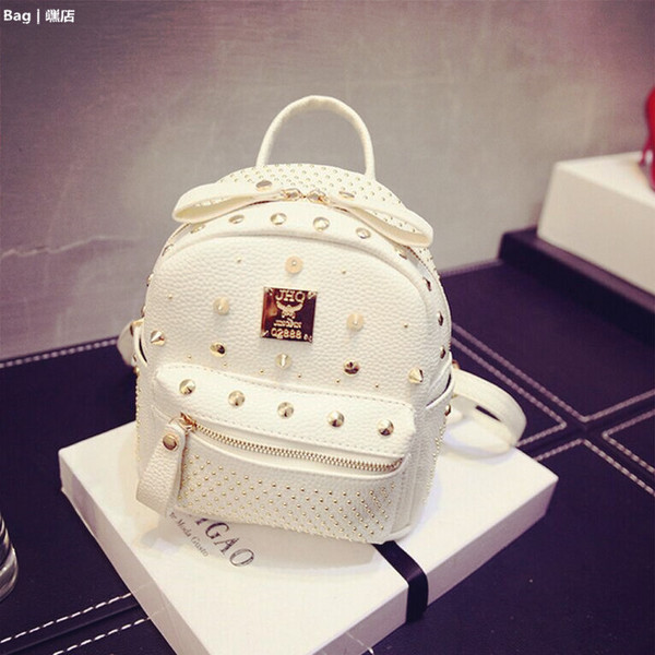 Rucsac de zi cu zi pentru femei in mai multe culori cu ochiuri metalice