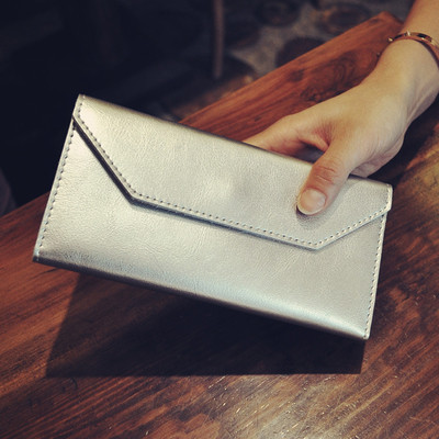 Stílusos női pénztárca típusú táska többféle színben