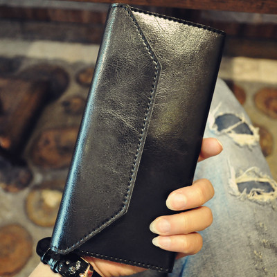 Stílusos női pénztárca típusú táska többféle színben