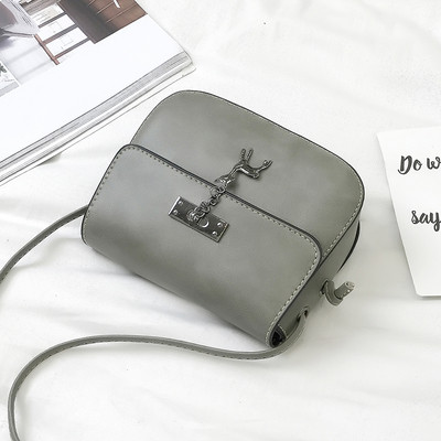 Geanta de dama din piele ecologica in marime mini cu curea lunga si element metalic