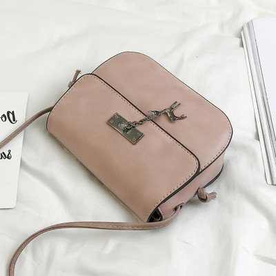 Geanta de dama din piele ecologica in marime mini cu curea lunga si element metalic